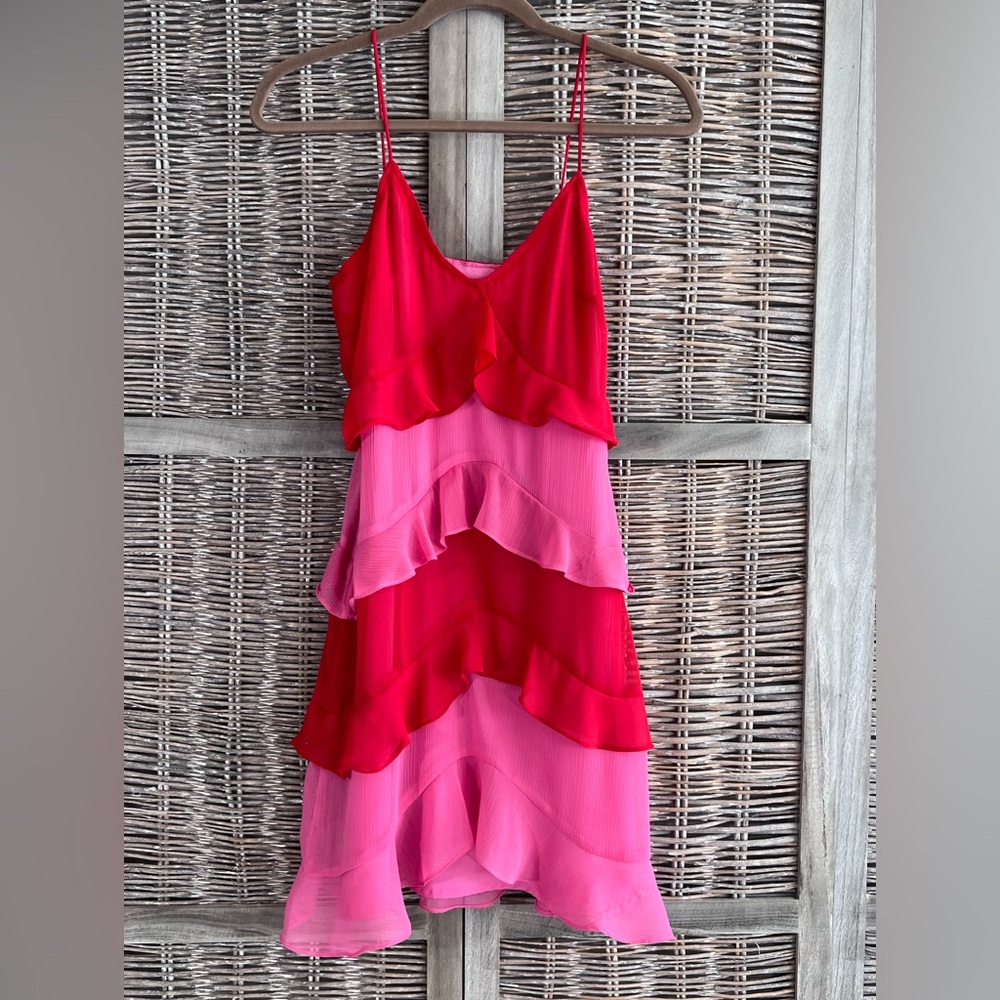 Never Fully Dressed layered ruffled mini dress in tiered red and pink. Size 2.